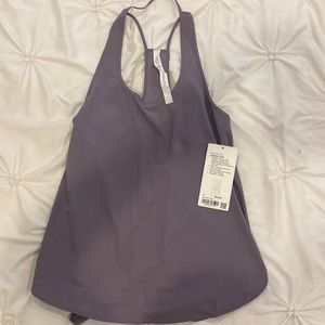 New with tags - size 4 women’s lululemon coastal tank. Lavender.